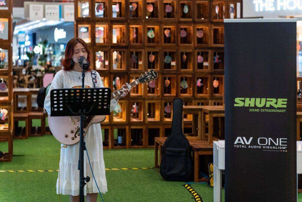 Denise Teo (aka "supercatkei") performing at the AV One and Shure workshop